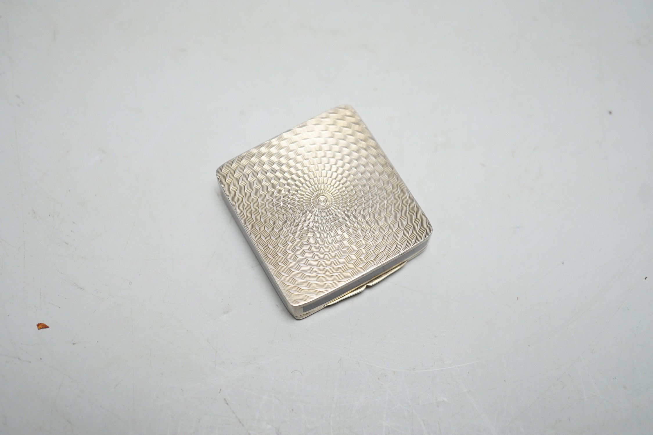 A German sterling white metal and enamelled square compact, 42mm.